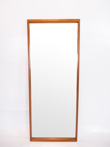Tall mirror of oak designed by Aksel Kjærsgaard from the 1960s.
