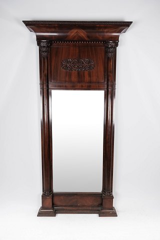 Tall mirror of mahogany with carvings, in great antique condition from around 
1840.
