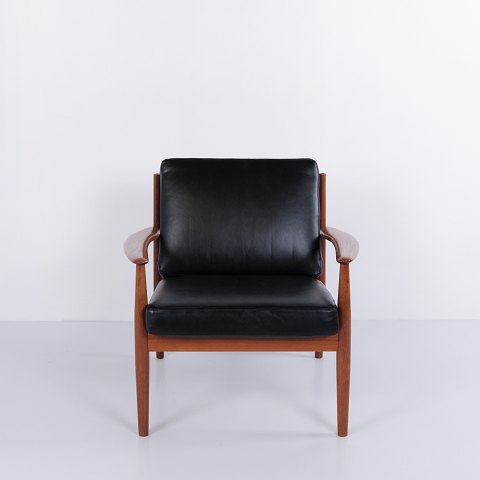 Sessel von Grete Jalk für France & Søn aus Teakholz und schwarzem Leder, 1960er Jahre