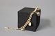 Bismark bracelet with 4 charms in 8 ct. gold by Hermann Siersbøl.5000m2 showroom.