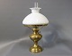 Kerosene table lamp in brass with a White glass dome.5000m2 showroom.