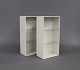 A pair of white Bookcase by Montana with glass shelves.5000m2 showroom.