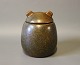 Ceramic lidded jar with dark brown glaze by Erik Rahr for Saxbo.5000m2 showroom.