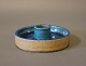 Small ceramic candlestick with dark blue glaze by Herman A. Kähler.5000m2 showroom.