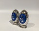 Salt and pepper shakers in 925 sterling silver and dark blue enamel by MEKA.5000m2 showroom.