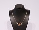Necklace of 925 sterling silver with large pendant of amber.5000m2 showroom.
