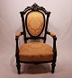 Armchair in the style Rokoko of mahogany and yellow fabric.5000m2 showroom.