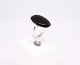 Ring decorated with large black onyx stone and of 925 sterling silver.5000m2 showroom.