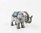 Money box in the shape of a elephant from the 1960s.10 x 18 x 5 cm.