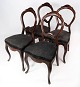 Set of four rococo dining room chairs of mahogany and upholstered with black 
fabric, in great antique condition from around 1880. 
5000m2 showroom.
