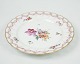 Antique royal plate pierced in patterned Saxon flower with 3 waves.
Dimensions in cm: H: 3 Dia: 22.5
