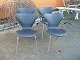 4 Arne Jacobsen chairs, model 7  with arms in black leather.Restored5000 m2 
showroom