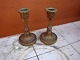 A pair of french lyre bronze gilded candlesticks from around 1880. The Price for the pair is 1800 kr. 5000m2 showroom.